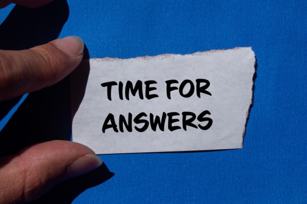 Time for answers written on a torn paper depicting FAQs about propane tank levels