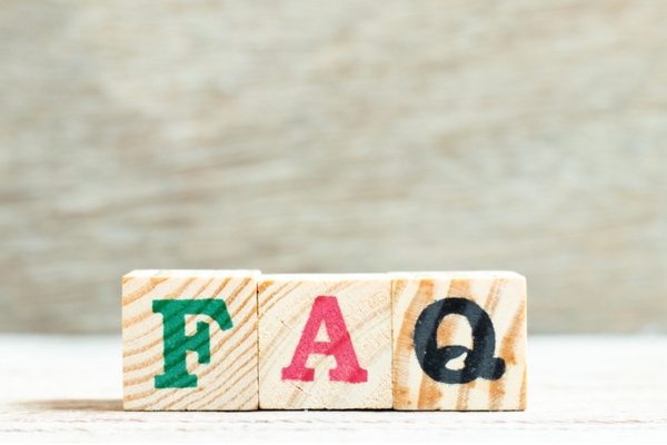 FAQ spelled using letters stamped on wooden cubes depicting Energy Kinetics System 2000 Boiler Installation
