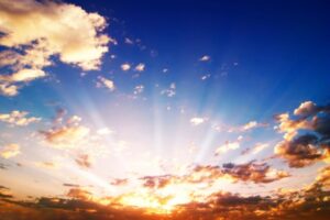 sun and clouds depicting summer heat