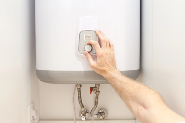 homeowner setting water heater temperature