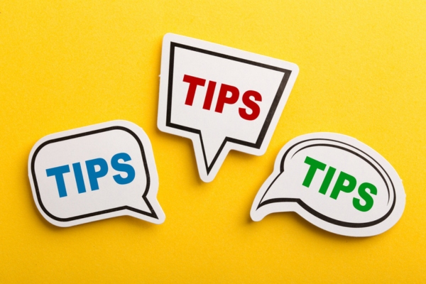 tips written on speech bubbles depicting Tips to Enhance Water Heater Efficiency and Longevity