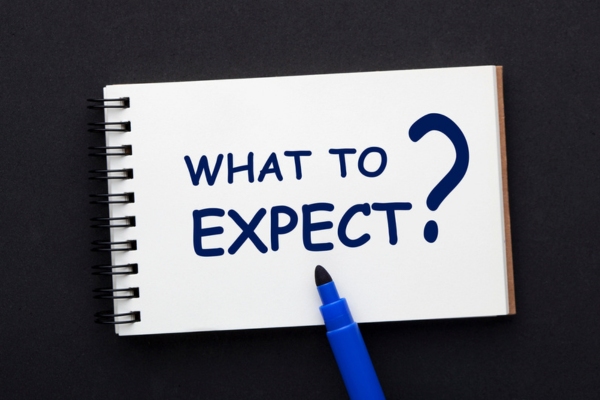 what to expect written on a notebook depicting water heater lifespan