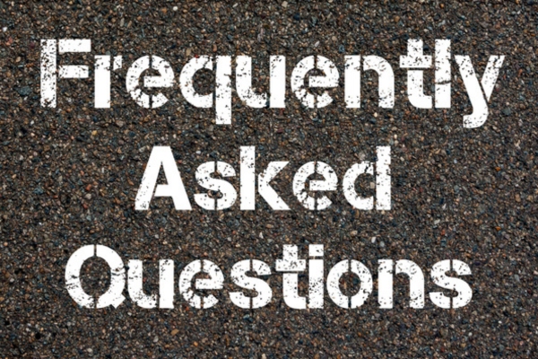 Frequently Asked Questions spray painted on concrete depicting FAQs about Heating Oil in Summer
