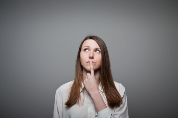 image of a thinking woman depicting Identifying and Resolving Rotten Egg Odors in Your Water Supply