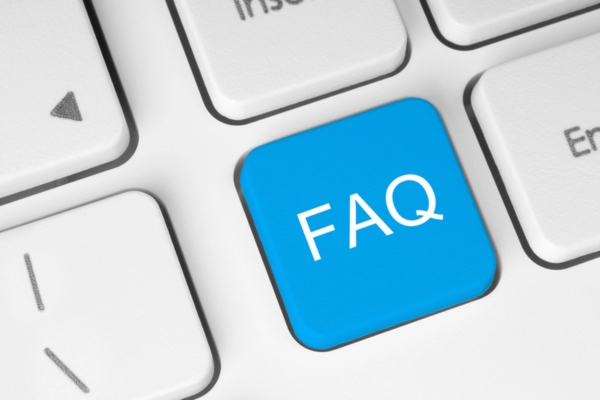 FAQ on a keyboard key depicting questions about Plumber Service Company