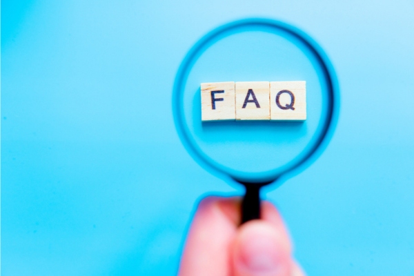 FAQ spelled using mini letter chips highlighted by a magnifying glass depicting questions about Propane Tank Regulators