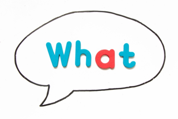 What spelled using letter cutouts inside a speech bubble depicting propane storage tank regulator