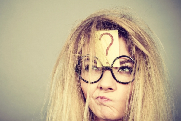 messy-haired woman with a question mark on a sticky note on her forehead depicting FAQs about Propane Efficiency