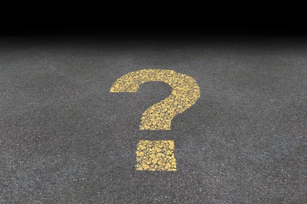 question mark spray painted on a road depicting Furnace Troubleshooting FAQs