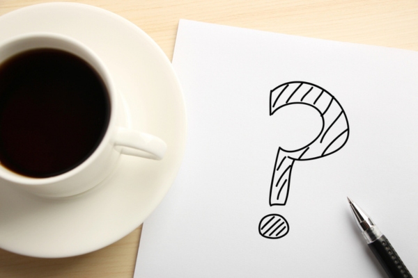 coffee cup and question mark doodle depicting FAQs About HVAC Airflow