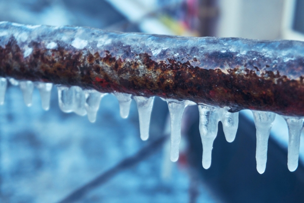 frozen rusty pipe