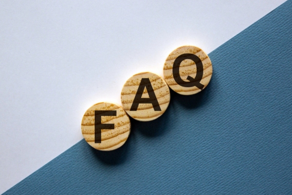 FAQ spelled using circular wooden letter chips depicting How to Improve Indoor Air Quality questions