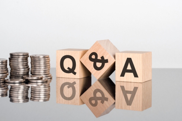 Q&A on a wooden letter cubes depicting Air Conditioning Facts FAQ