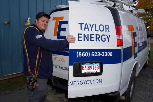 Taylor Energy professional HVAC service technician and van