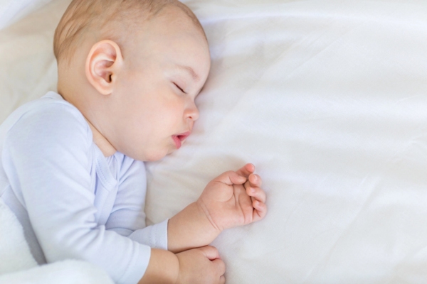 baby sleeping soundly depicting central AC not noisy