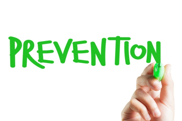 PREVENTION written on a virtual board using green marker