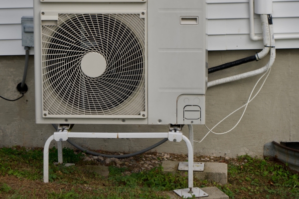ductless Air Conditioner outdoor unit installed outside the house