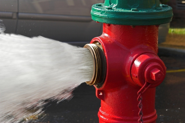 image of a flushing fire hydrant