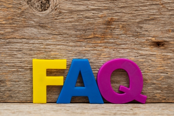 FAQ spelled using colorful plastic letters depicting AC Blowing Weak questions