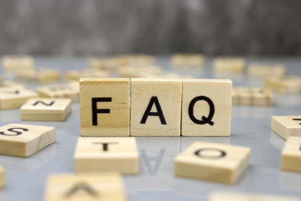 FAQ spelled using wooden letter chips depicting Turn Off Water Before Vacation questions