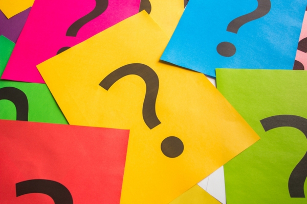 question marks on colored paper depicting FAQs About Trusted Heating Oil