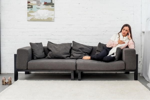 woman feeling cold indoors due to uneven air balancing