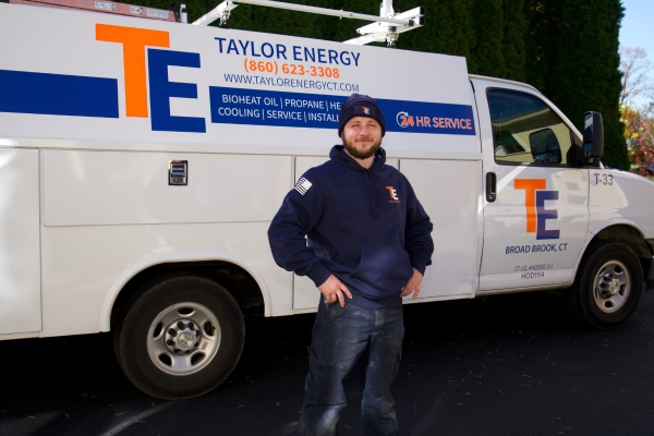 Taylor Energy HVAC technician about to perform a Yearly Furnace Maintenance